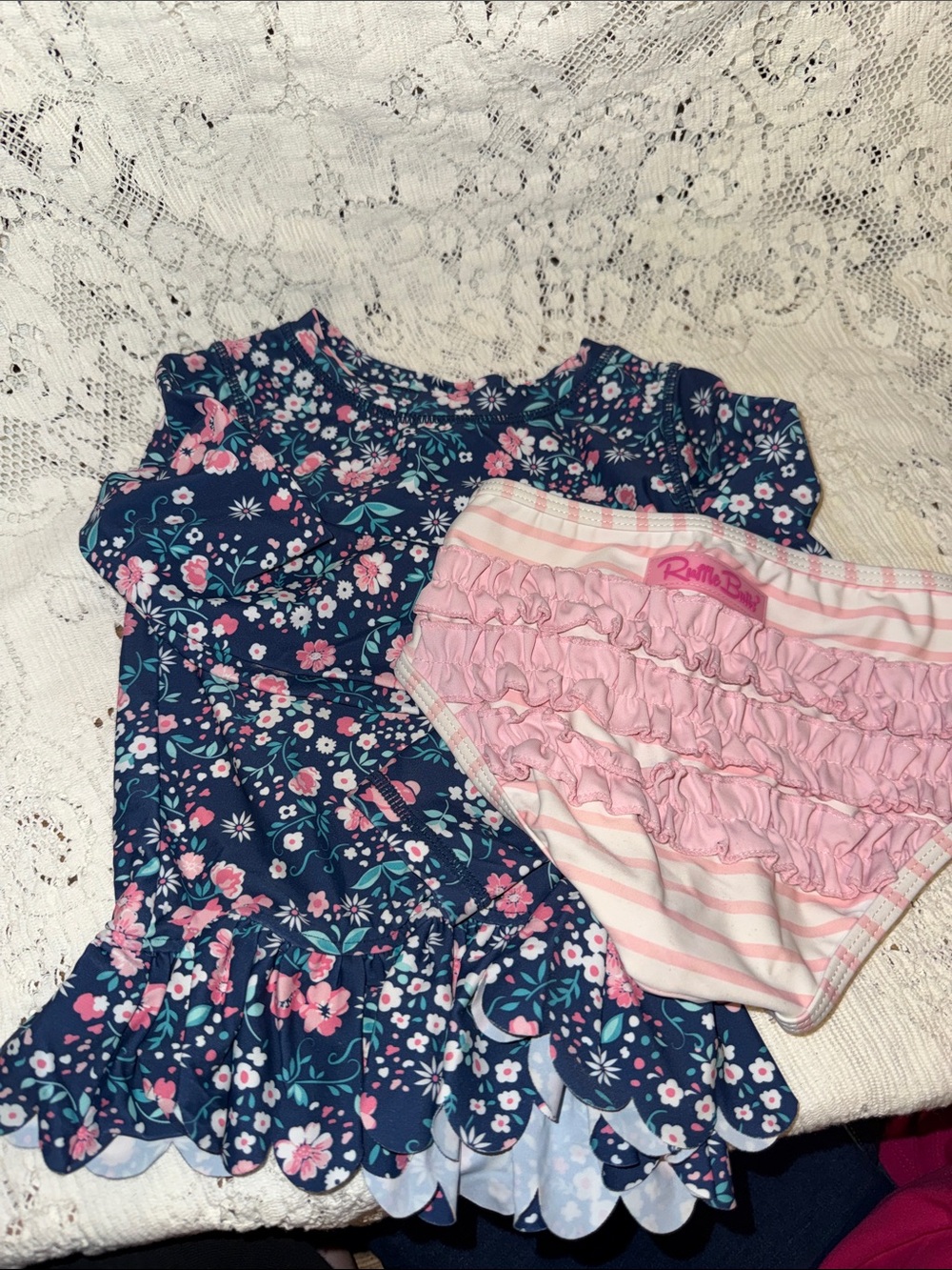 Ruffle Butts Navy Floral Ruffle Bikini Set with Pink Stripe Ruffle Bottoms
